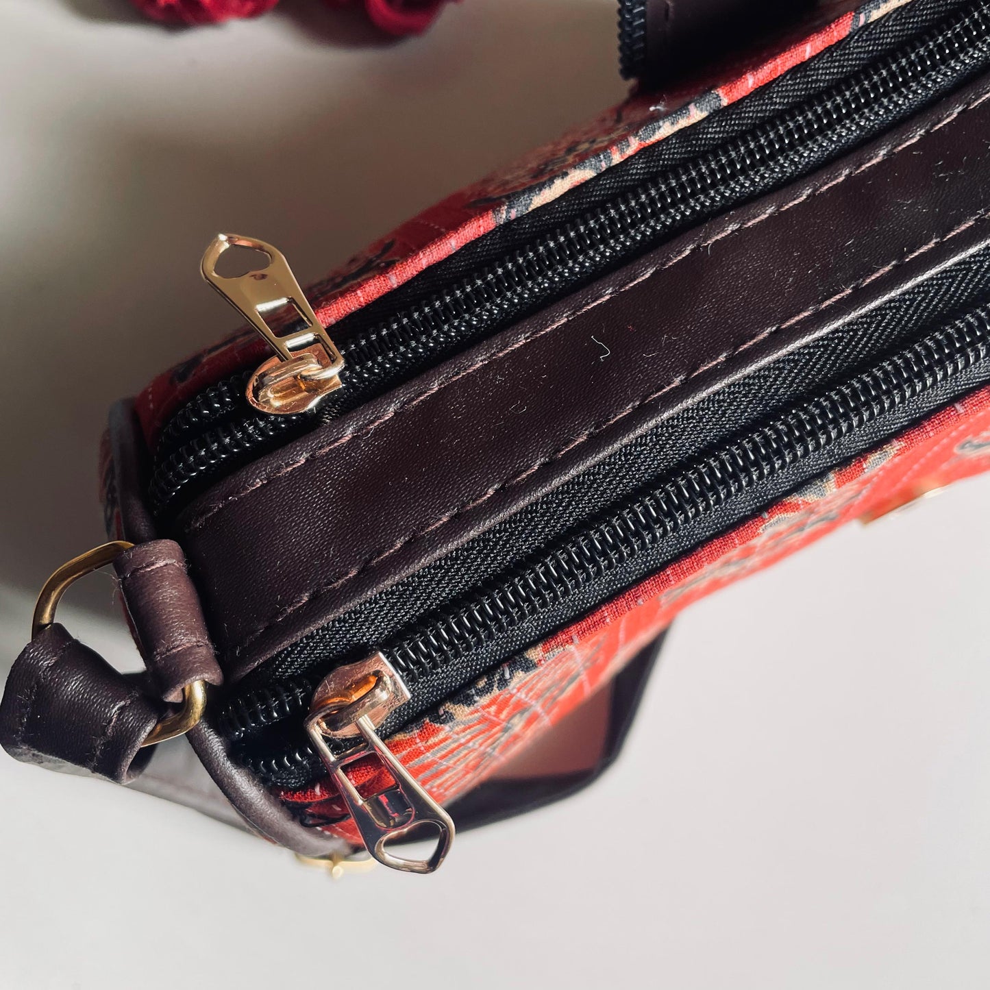 Regal Red Crossbody Bag with Traditional Floral Print