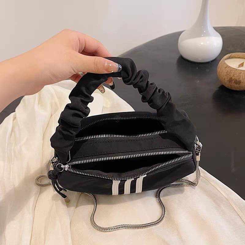 Sporty Black Shoulder Bag with White Stripes