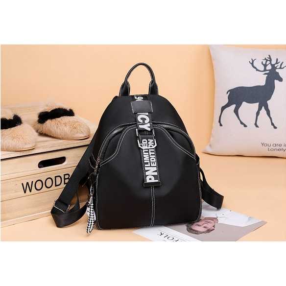 Trendy Black "Limited Edition" Backpack with Stylish Strap Detailing